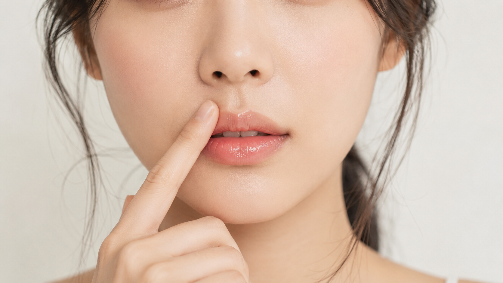 a woman concerned about the length of her philtrum